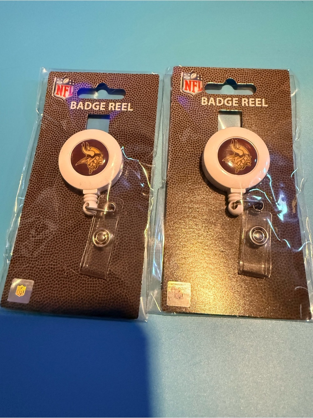 NFL Minnesota Vikings Pink and Purple Badge Reel Duo with Team Logo